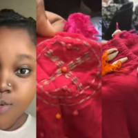 Confusion arises as woman finds cowries and unusual mark on dress bought in bale of imported clothes