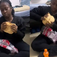 Reactions as lady ignores advise, eats big bread at 2am