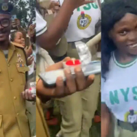 “Why is he standing” – Reactions as NDLEA official proposes to female corps member