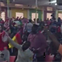 Moment members Of A Church In Ghana Pray With Passport And Flag Of Country They Want To Relocate To