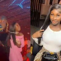 Lady Shocked As P-Square Gifts Her Diamond Chain And ₦10m At A Concert