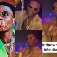 Fans reacts as Wizkid intentionally pours away drink given to him at a nightclub